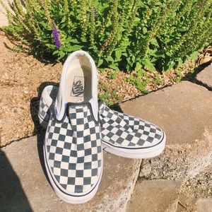 Black checkered slip-on vans
